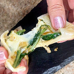 Triángulos de espinaca y queso